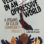 Picture of a hand with a piece of string on one finger connected to a dangling shape of an animal with a series of raised fists below. Text on the image says "Veganism In An Oppressive World. A Vegans Of Color Community Project. Edited by Julia Feliz Brueck."