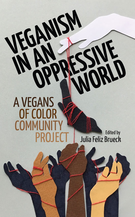 Picture of a hand with a piece of string on one finger connected to a dangling shape of an animal with a series of raised fists below. Text on the image says "Veganism In An Oppressive World. A Vegans Of Color Community Project. Edited by Julia Feliz Brueck."