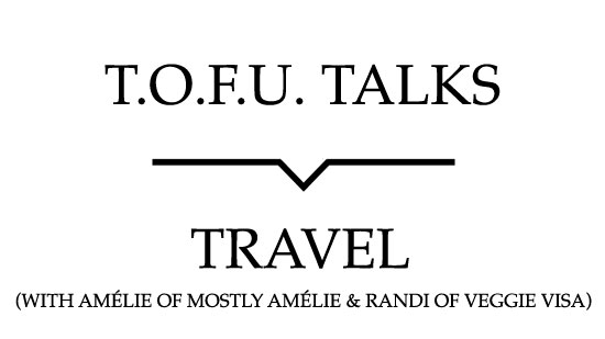 Image contains a white background with black text that says "T.O.F.U. Talks" above a black line with a small indent in the centre pointing below to text that says "Travel (With AmÃ©lie of Mostly AmÃ©lie and Randi of Veggie Visa)".