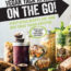 Image contains a grey background with black text at the top that says "Vegan Yack Attack" and a black arrow below that spans the width of the whole image. Within this arrow, white text says "On the Go!". Below the arrow, there is green text that says "Plant-Based Recipes For Your Fast-Paced Vegan Lifestyle". Below the text, in the remaining half of the image, there are a series of jars with food items such as pasta, a smoothie, salad, and more. As well, salad wraps and cookies are included on a wooden countertop.