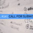 Image contains a notepad with illegible text in black ink and a pen on the left-hand side. In the foreground, there is text in the middle of the screen on a strip of blue that says "T.O.F.U. #14 |" in white and "Call For Submissions" in black. Below the word "submissions", the word "Extended" is in white.