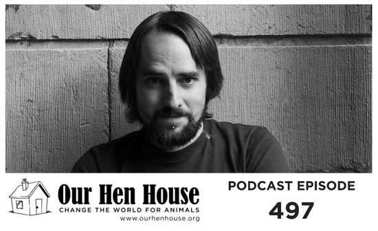 Image contains a black and white photo of a male with long hair and a beard. The man is staring into the camera with a slight smile. The left side of his face is partially in shadow. Behind him, large bricks are visible. Below the picture and to the left, there is black text that says "Our Hen House Change the World for Animals www.ourhenhouse.org" next to a small cartoon house. To the right of this text, there is text that says "Podcast Episode 497".